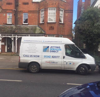 Cleared gulley at the rear of property in King Charles Road, Surbiton, South West London KT5