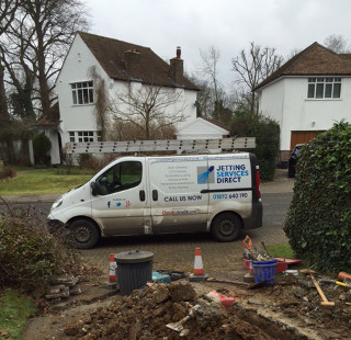 Drain excavation renewing foul drain line in Topcliffe Drive, Orpington, Kent BR6