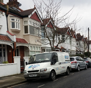 Jet cleaning blocked kitchen gully in Canford Road, Battersea, South London SW11